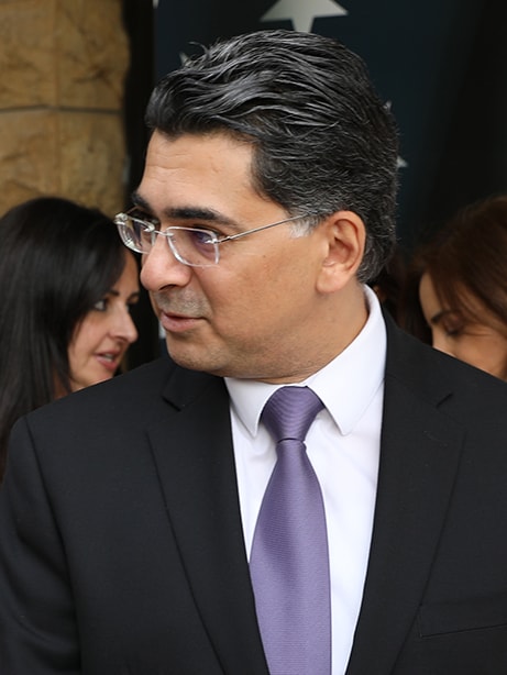  Lebanese Information Minister Paul Morcos wearing a suit and blue tie