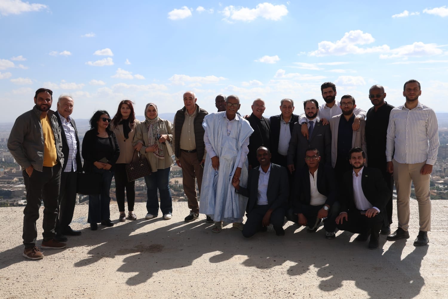 Group photograph of an Arab journalists delegation during a visit to Damascus, Syria