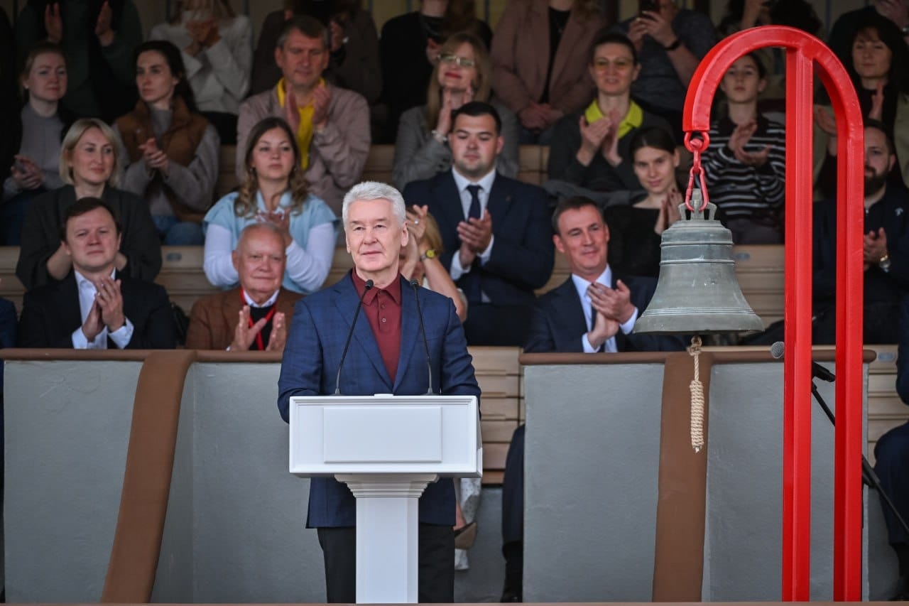 Moscow Mayor Sergey Sobyanin speaking at an official event in Moscow, with the official emblem of the Mayor of Moscow in the background.